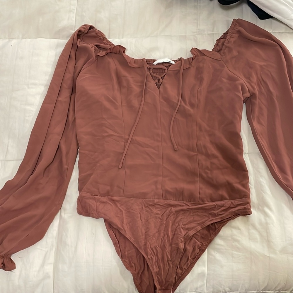 Heatherly long sleeve body suit. Size large petite.